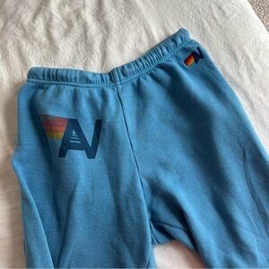 Aviator Nation Blue Joggers with Rainbow Logo